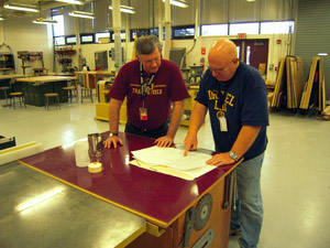 Looking over the lantern plans.