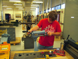 Burring bottom of fuel tank.