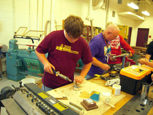 Soldering tank holder to lantern base.