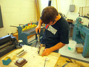 Soldering belt clip to handle bracket.